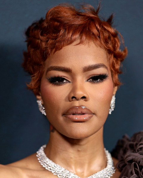 Closeup of Teyana Taylor with Shellac gloss makeup.